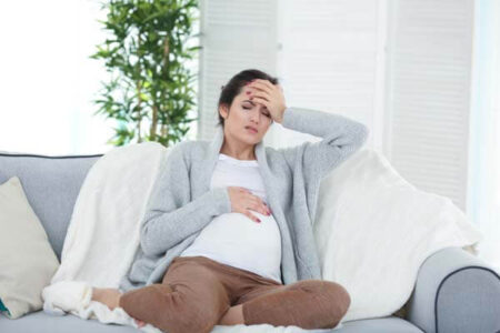 Hoofd- en buikpijn zwanger